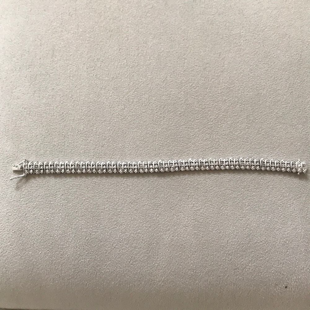 Silver and diamond tennis bracelet